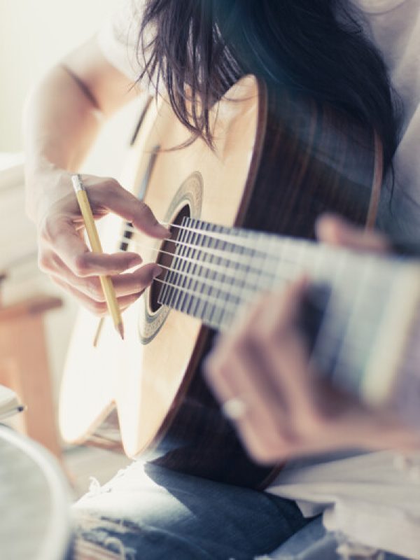 artist songwriter thinking writing notes,lyrics in book at studio.man playing live acoustic guitar relax chill.concept for musician creative.composer work process.people relaxing time with instrument artist songwriter thinking writing notes,lyrics in book at studio.man playing live acoustic guitar relax chill.concept for musician creative.composer work process.people relaxing time with instrument